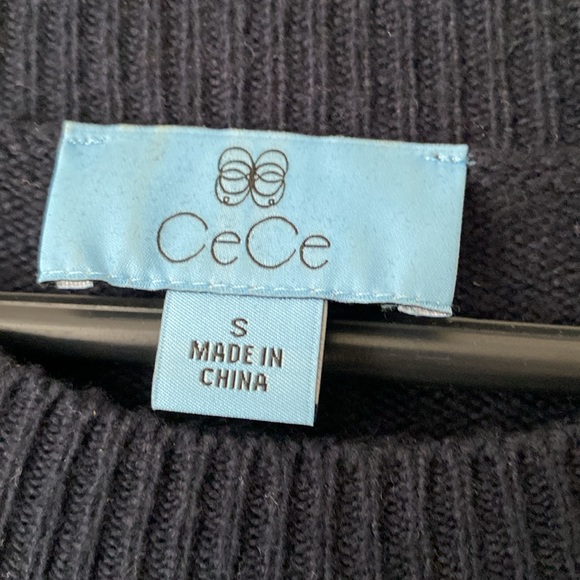 Adorable sweater. Navy with black fuzzy balls. Made by CeCe size small. - Picture 2 of 7